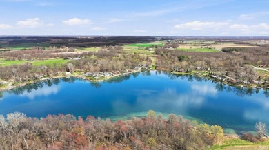 Imagine waking up to 264 feet of shimmering Rock Lake shoreline - photo 3