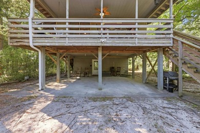 Tucked beneath a canopy of mature trees just minutes from the - photo 3