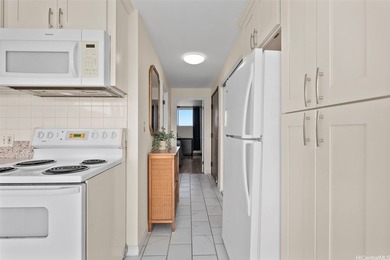 High-floor Aloha Lani unit in central Waikiki with sweeping - photo 7
