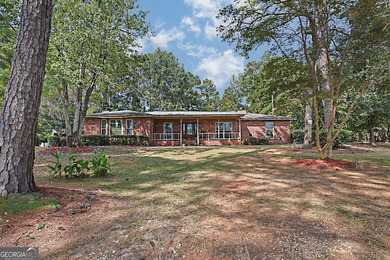 Secluded Brick Ranch Retreat on 20+ Acres with Private Lake & - photo 2