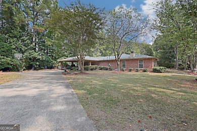 Secluded Brick Ranch Retreat on 20+ Acres with Private Lake & - photo 5