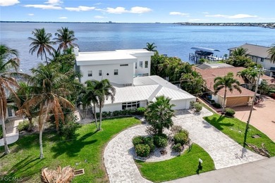 Discover this unique and elegant 2-story waterfront mansion in - photo 3