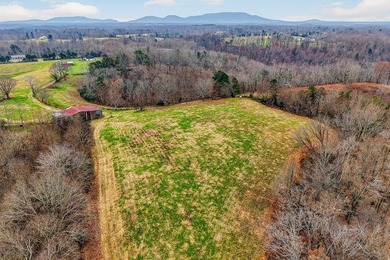 This century farm features a mix of open and wooded acreage with - photo 16