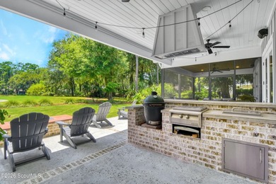 Tucked into a coveted corner of St Simons Island, this - photo 29