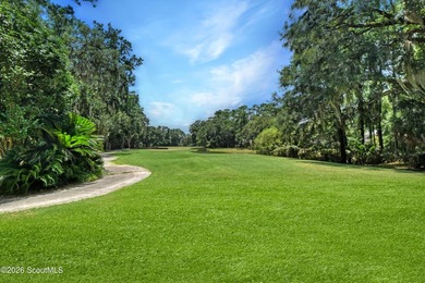 Tucked into a coveted corner of St Simons Island, this - photo 34