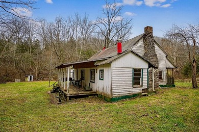 This century farm features a mix of open and wooded acreage with - photo 34