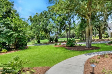 Tucked into a coveted corner of St Simons Island, this - photo 35