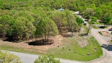Ready to start your lake life? This half-acre corner lot in - photo 1