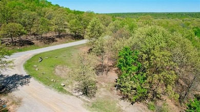 Ready to start your lake life? This half-acre corner lot in - photo 6