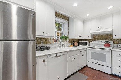 VILLAGE OF ROSLYN. Welcome to 80 E. Broadway, where timeless - photo 13