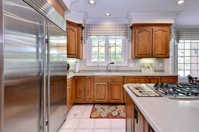 An exquisite home nestled on a double homesite bordering a - photo 27