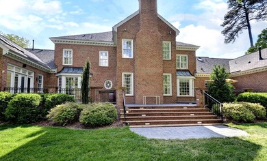 An exquisite home nestled on a double homesite bordering a - photo 46