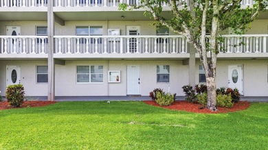 Welcome to this beautifully renovated condo offering a bright - photo 1