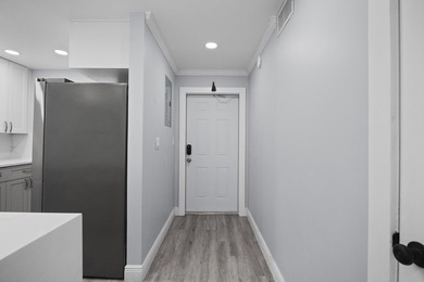 Welcome to this beautifully renovated condo offering a bright - photo 2