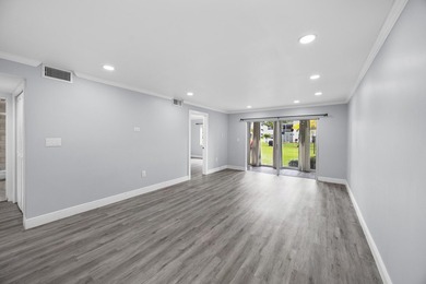 Welcome to this beautifully renovated condo offering a bright - photo 3