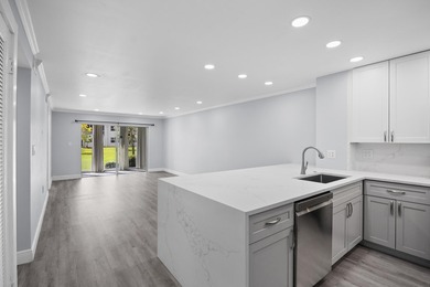 Welcome to this beautifully renovated condo offering a bright - photo 5