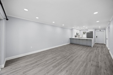 Welcome to this beautifully renovated condo offering a bright - photo 7