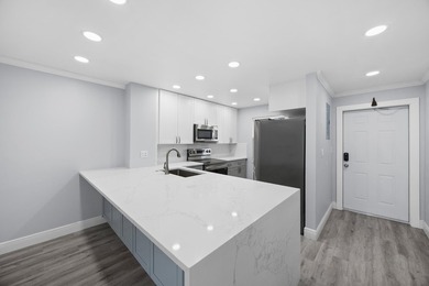 Welcome to this beautifully renovated condo offering a bright - photo 10