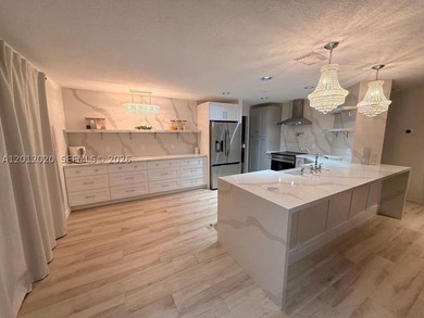 Step into luxury in this highly renovated 4-bedroom, 2.5-bath - photo 3