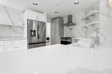 Step into luxury in this highly renovated 4-bedroom, 2.5-bath - photo 4