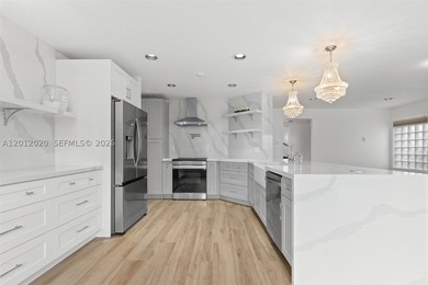 Step into luxury in this highly renovated 4-bedroom, 2.5-bath - photo 6