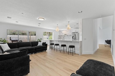 Step into luxury in this highly renovated 4-bedroom, 2.5-bath - photo 8