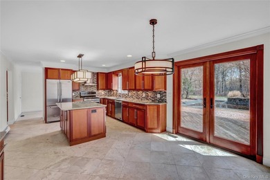 Set on nearly an acre in the heart of Miller Place, this - photo 12