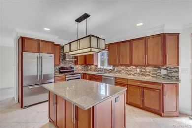 Set on nearly an acre in the heart of Miller Place, this - photo 13