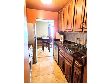 This rare 17th-floor, two-bedroom, one-bathroom condo offers - photo 3