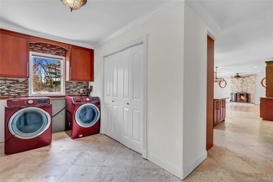 Set on nearly an acre in the heart of Miller Place, this - photo 15