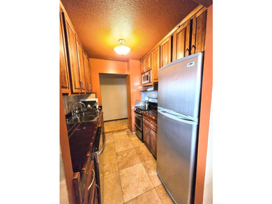 This rare 17th-floor, two-bedroom, one-bathroom condo offers - photo 6