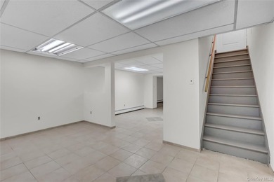 Set on nearly an acre in the heart of Miller Place, this - photo 17