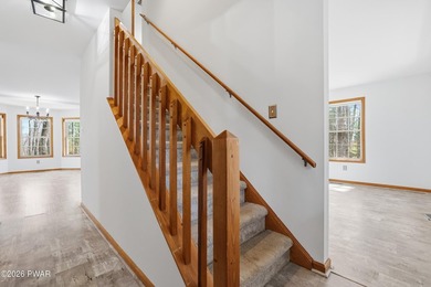 This beautifully maintained home sits on a 1-acre wooded - photo 18