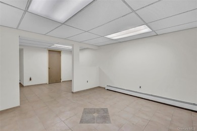 Set on nearly an acre in the heart of Miller Place, this - photo 20