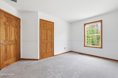 This beautifully maintained home sits on a 1-acre wooded - photo 20