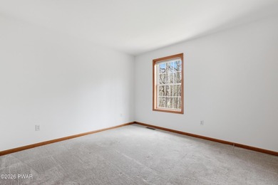This beautifully maintained home sits on a 1-acre wooded - photo 21