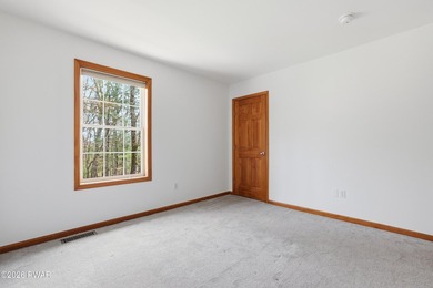 This beautifully maintained home sits on a 1-acre wooded - photo 22