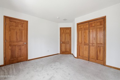 This beautifully maintained home sits on a 1-acre wooded - photo 23
