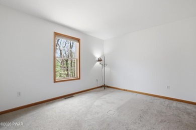 This beautifully maintained home sits on a 1-acre wooded - photo 24