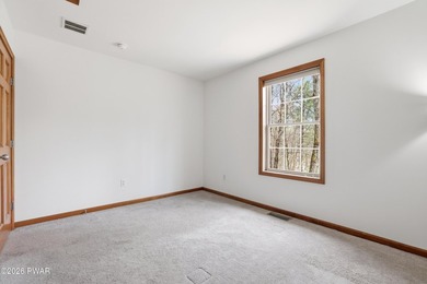 This beautifully maintained home sits on a 1-acre wooded - photo 25