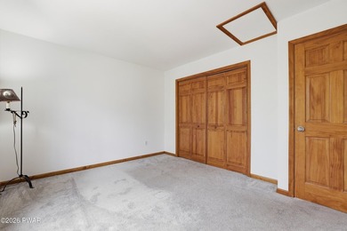 This beautifully maintained home sits on a 1-acre wooded - photo 26