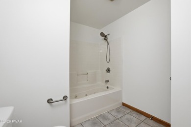 This beautifully maintained home sits on a 1-acre wooded - photo 27