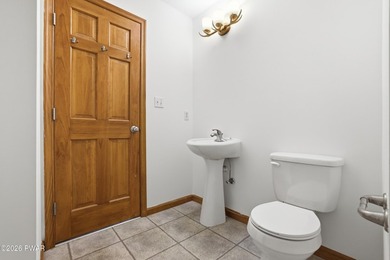 This beautifully maintained home sits on a 1-acre wooded - photo 28