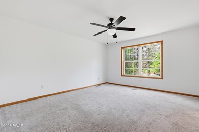 This beautifully maintained home sits on a 1-acre wooded - photo 29