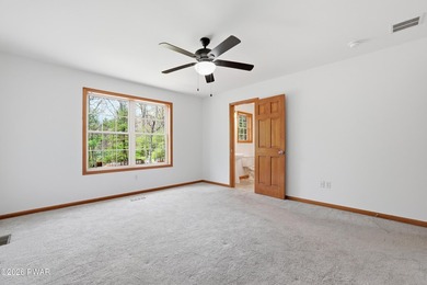 This beautifully maintained home sits on a 1-acre wooded - photo 30
