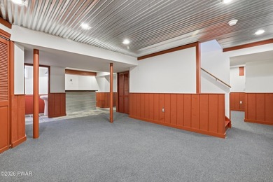 This beautifully maintained home sits on a 1-acre wooded - photo 35