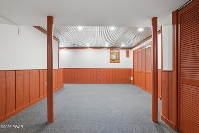 This beautifully maintained home sits on a 1-acre wooded - photo 37