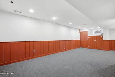 This beautifully maintained home sits on a 1-acre wooded - photo 40