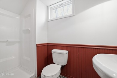 This beautifully maintained home sits on a 1-acre wooded - photo 42