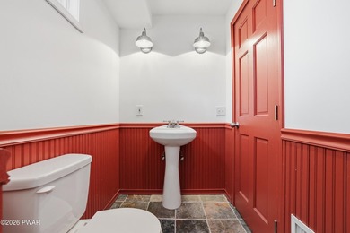 This beautifully maintained home sits on a 1-acre wooded - photo 43